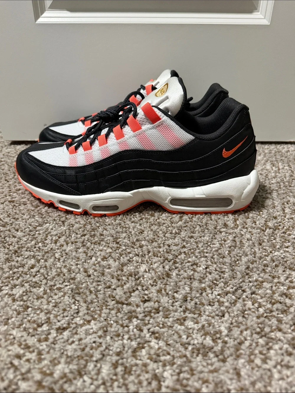 Nike Air Max 95 in Black, White & Orange